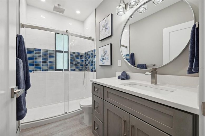 Bathroom, Glass Shower, Interior, Recessed Lighting, Wood Texture Flooring