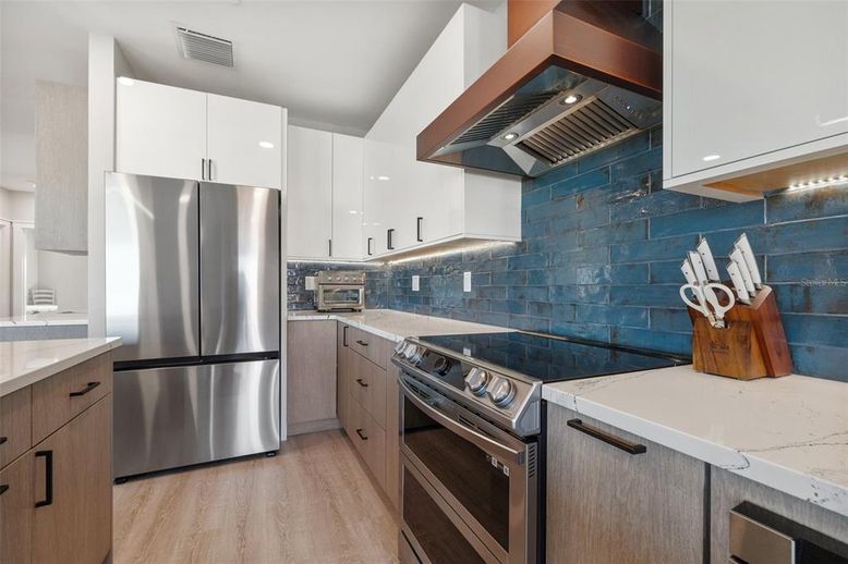 Interior, Kitchen, Recessed Lighting, Stainless Steel Appliances, Wood Texture Flooring