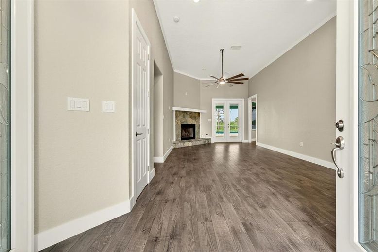 Empty room, Fireplace, Interior, Recessed Lighting, Wood Texture Flooring