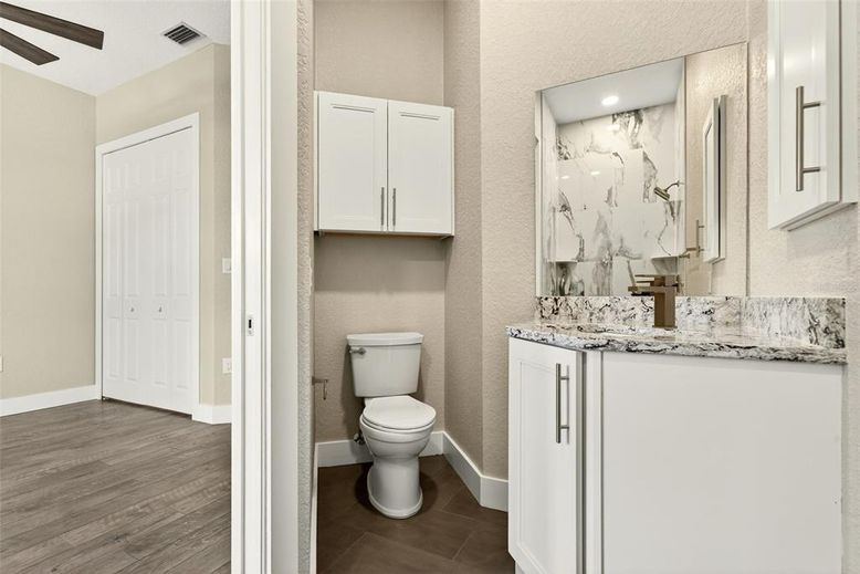Bathroom, Interior, Marble Walls, Recessed Lighting, Wood Texture Flooring