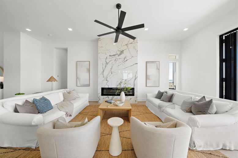 Fireplace, Interior, Living room, Marble Walls, Recessed Lighting, Wood Texture Flooring