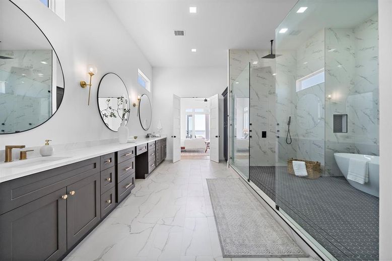 Bathroom, Dual Sink Vanities, Glass Shower, Interior, Marble, Marble Walls, Recessed Lighting