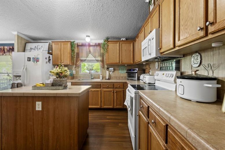 Interior, Kitchen, Tile Countertops, Wood Texture Flooring
