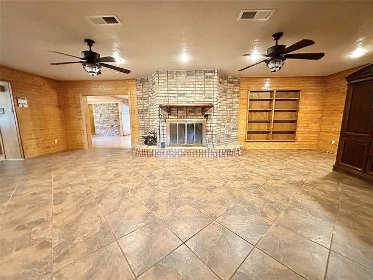 Empty room, Fireplace, Interior, Recessed Lighting, Stone Walls, Wooden Walls