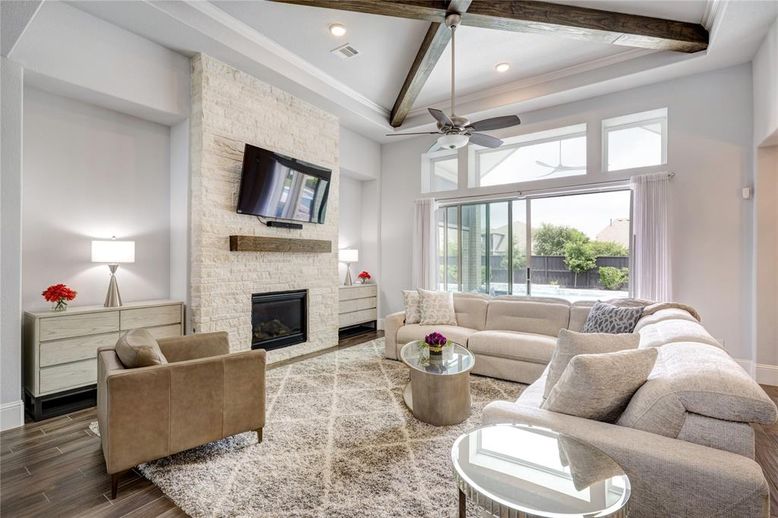 Fireplace, Interior, Living room, Recessed Lighting, Stone Walls, Wood Texture Flooring