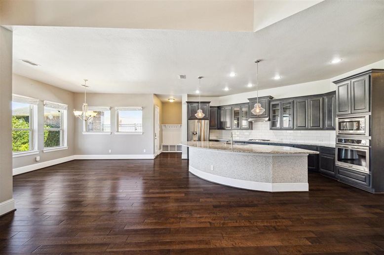 Chandelier, Interior, Kitchen, Pendant Lights, Recessed Lighting, Stainless Steel Appliances, Wood Texture Flooring
