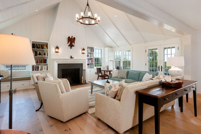 Chandelier, Dining room, Fireplace, Interior, Living room, Pendant Lights, Recessed Lighting, Wood Texture Flooring