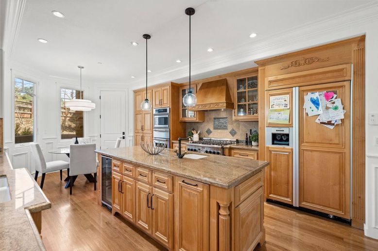 Dining room, Interior, Kitchen, Pendant Lights, Recessed Lighting, Stainless Steel Appliances, Wood Texture Flooring