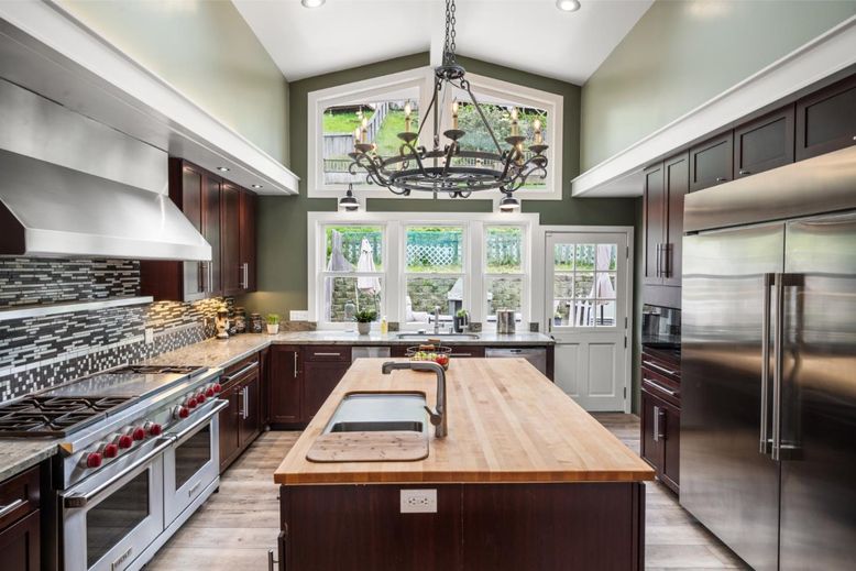 Chandelier, Interior, Kitchen, Pendant Lights, Recessed Lighting, Stainless Steel Appliances, Wood Texture Flooring