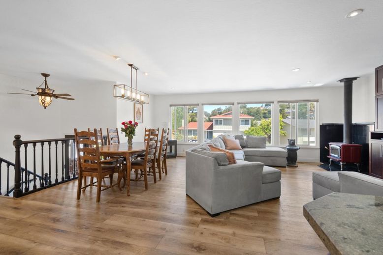 Dining room, Fireplace, Interior, Living room, Pendant Lights, Recessed Lighting, Wood Texture Flooring