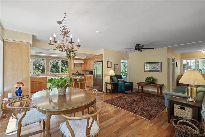 Chandelier, Dining room, Interior, Kitchen, Stainless Steel Appliances, Wood Texture Flooring