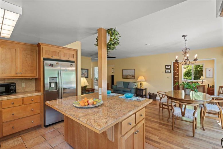 Chandelier, Dining room, Interior, Kitchen, Living room, Recessed Lighting, Stainless Steel Appliances, Wood Texture Flooring