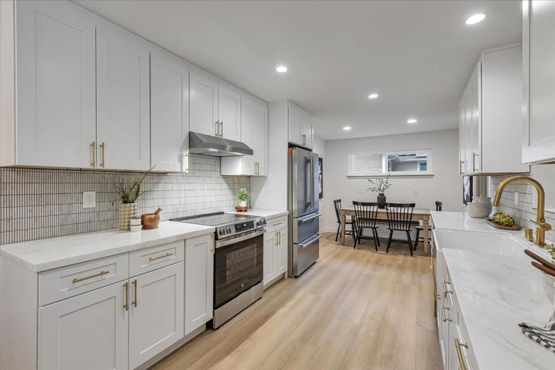Dining room, Interior, Kitchen, Recessed Lighting, Stainless Steel Appliances, Wood Texture Flooring
