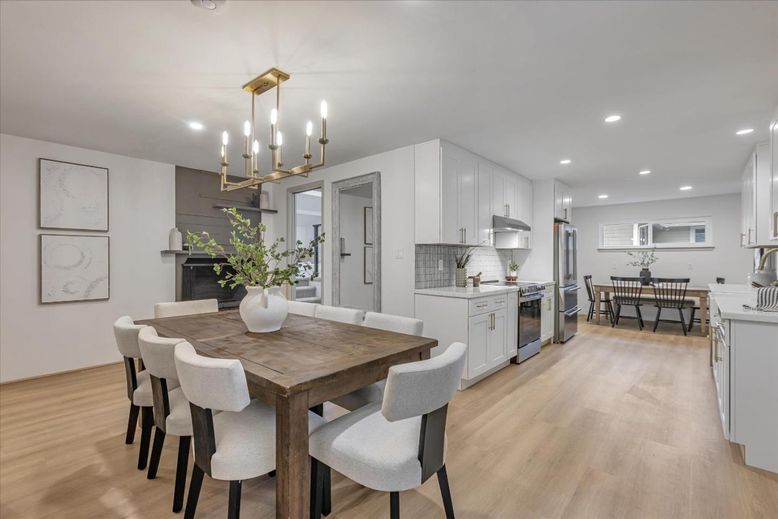 Dining room, Interior, Kitchen, Pendant Lights, Recessed Lighting, Stainless Steel Appliances, Wood Texture Flooring