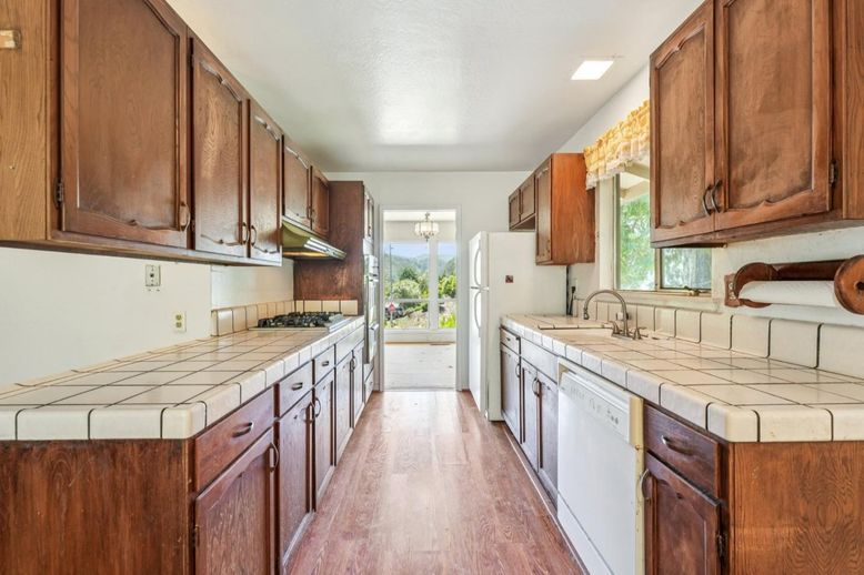 Interior, Kitchen, Tile Countertops, Wood Texture Flooring