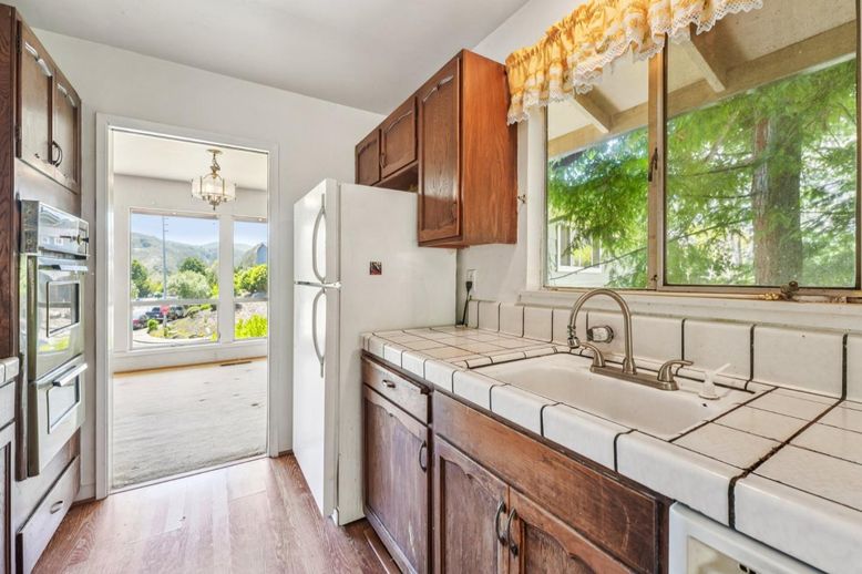 Chandelier, Interior, Kitchen, Tile Countertops, Wood Texture Flooring