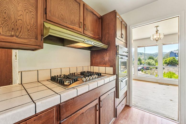 Interior, Kitchen, Tile Countertops, Wood Texture Flooring