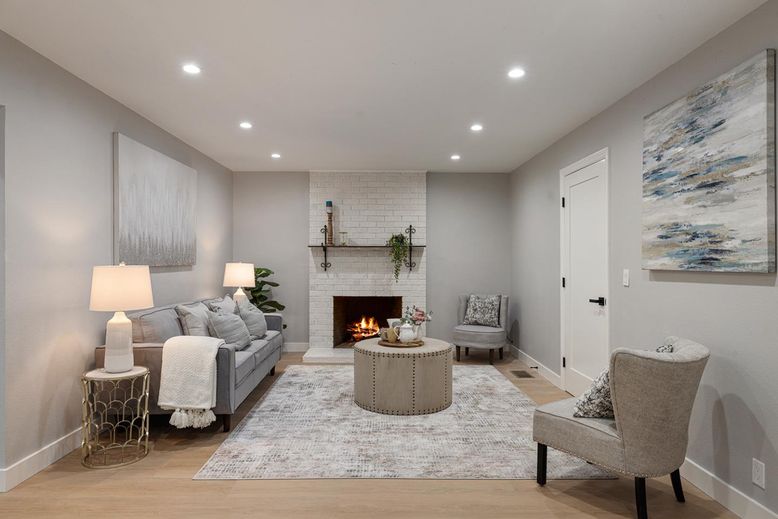 Fireplace, Interior, Living room, Recessed Lighting, Stone Walls, Wood Texture Flooring