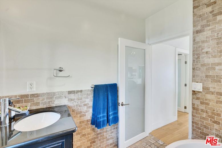 Bathroom, Glass Shower, Interior, Stone Walls, Wood Texture Flooring