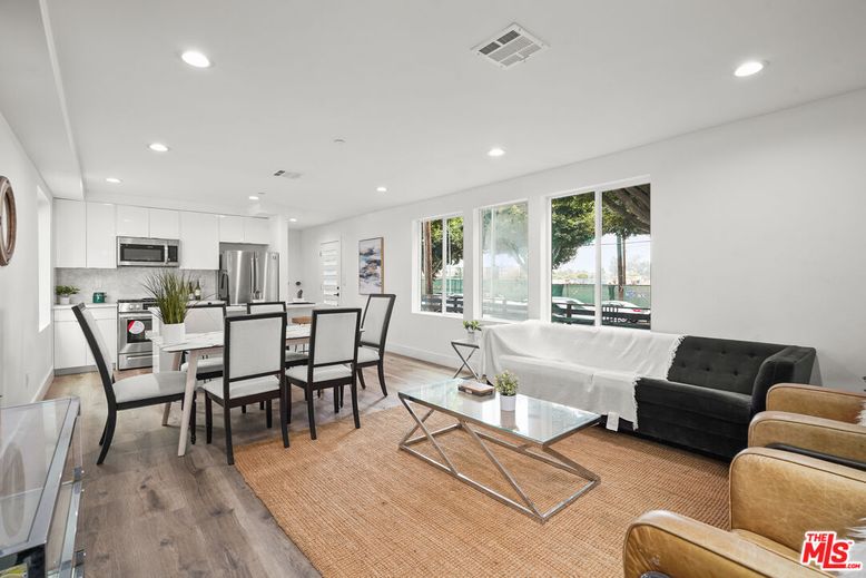 Dining room, Interior, Kitchen, Living room, Recessed Lighting, Stainless Steel Appliances, Wood Texture Flooring