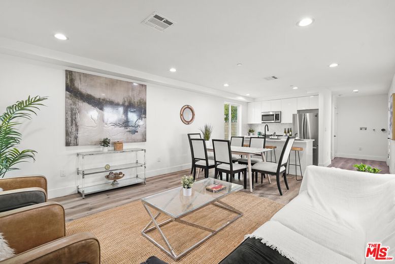 Dining room, Interior, Kitchen, Living room, Recessed Lighting, Stainless Steel Appliances, Wood Texture Flooring