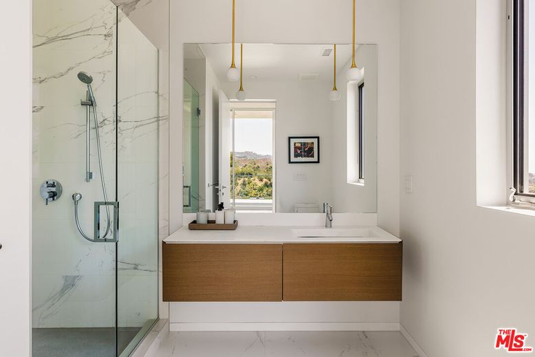 Bathroom, Dual Sink Vanities, Glass Shower, Interior, Marble, Marble Walls, Pendant Lights