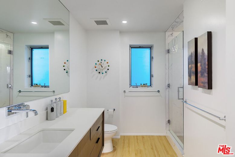 Bathroom, Dual Sink Vanities, Glass Shower, Interior, Recessed Lighting, Wood Texture Flooring