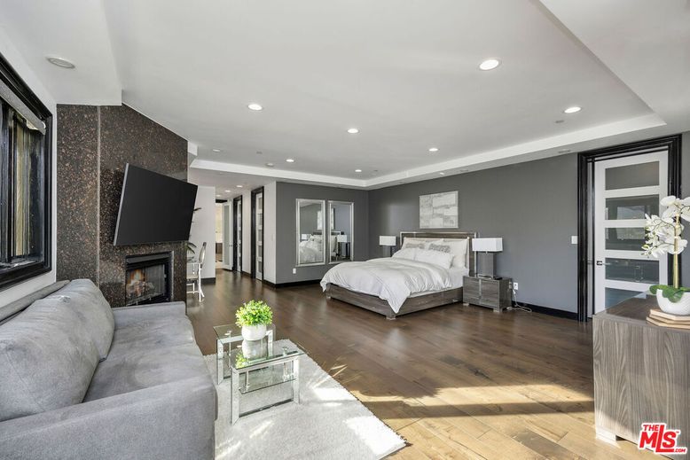 Bedroom, Fireplace, Interior, Recessed Lighting, Wood Texture Flooring