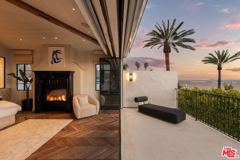 Exterior, Fireplace, Recessed Lighting, Water, Wood Texture Flooring