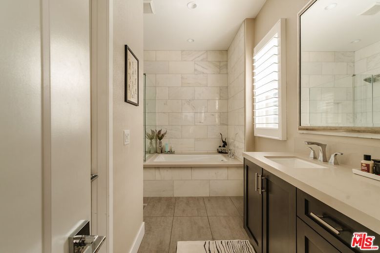 Bathroom, Dual Sink Vanities, Interior, Marble Walls, Recessed Lighting