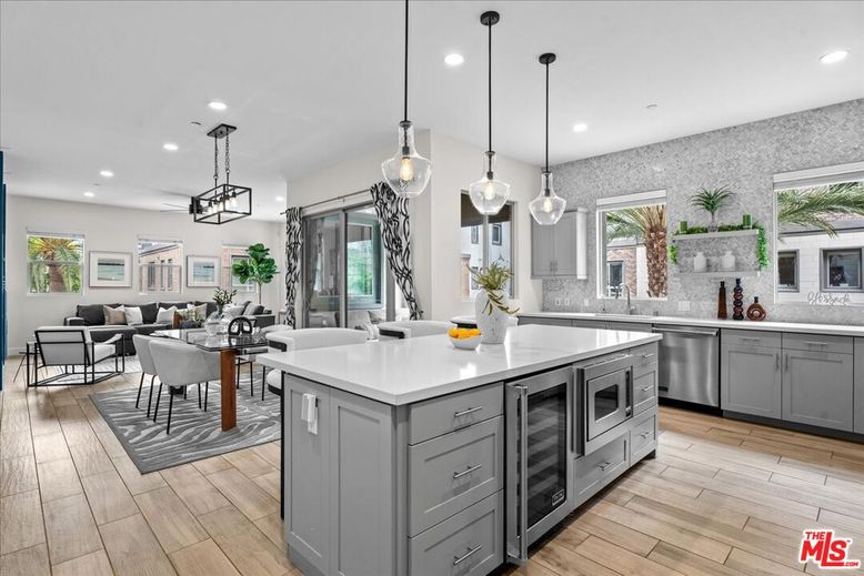 Dining room, Interior, Kitchen, Living room, Pendant Lights, Recessed Lighting, Stainless Steel Appliances, Wood Texture Flooring