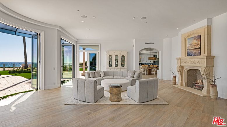 Fireplace, Interior, Living room, Pendant Lights, Recessed Lighting, Water, Wood Texture Flooring