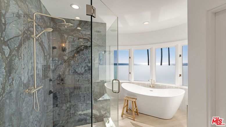 Bathroom, Free Standing Baths, Glass Shower, Interior, Marble Walls, Recessed Lighting, Water