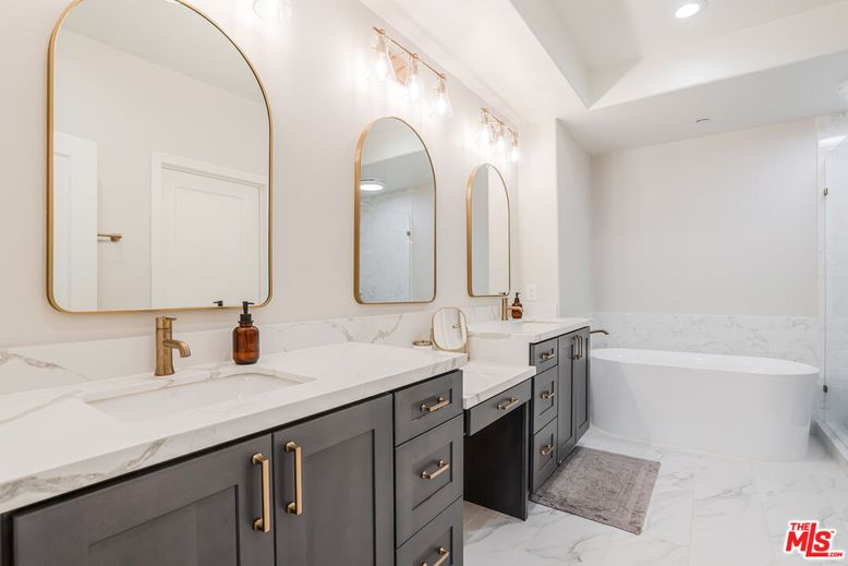 Bathroom, Dual Sink Vanities, Free Standing Baths, Interior, Marble, Marble Walls, Recessed Lighting