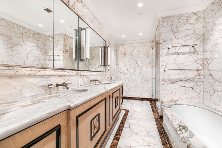 Bathroom, Dual Sink Vanities, Glass Shower, Interior, Marble, Marble Walls, Recessed Lighting