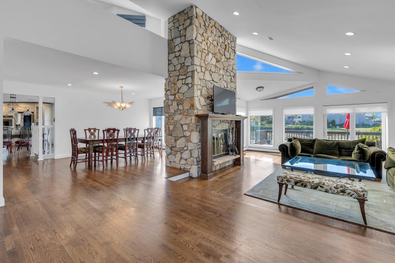 Dining room, Fireplace, Interior, Living room, Pendant Lights, Recessed Lighting, Stone Walls, Wood Texture Flooring