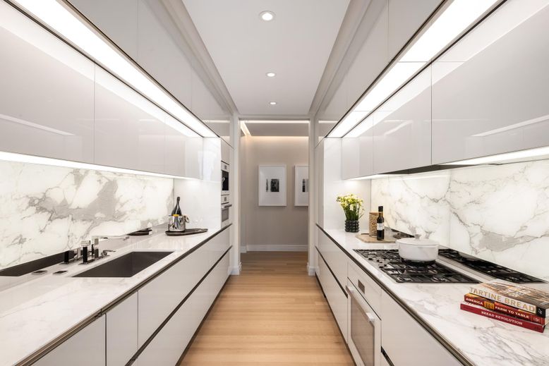 Interior, Kitchen, Marble Walls, Recessed Lighting, Stainless Steel Appliances, Wood Texture Flooring