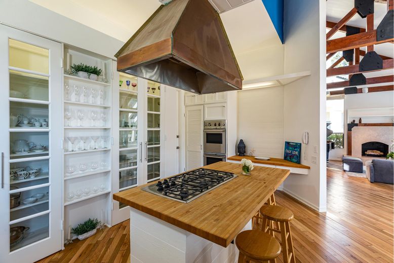 Fireplace, Interior, Kitchen, Stainless Steel Appliances, Wood Texture Flooring