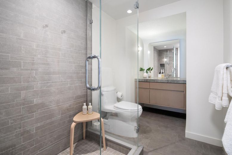 Bathroom, Glass Shower, Interior, Pendant Lights, Recessed Lighting, Stone Walls