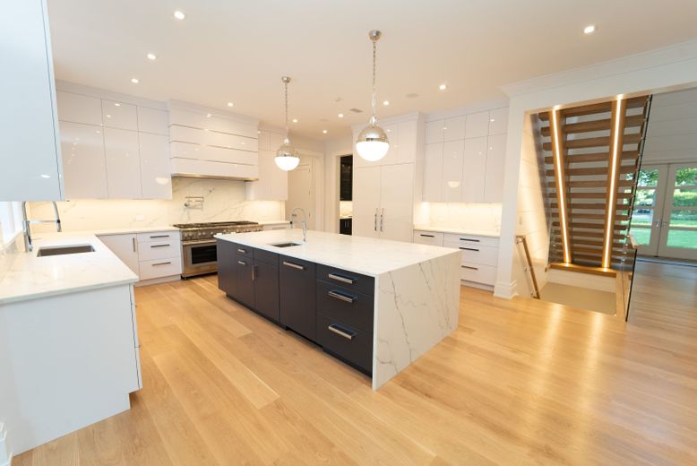 Interior, Kitchen, Marble Walls, Pendant Lights, Recessed Lighting, Stainless Steel Appliances, Wood Texture Flooring
