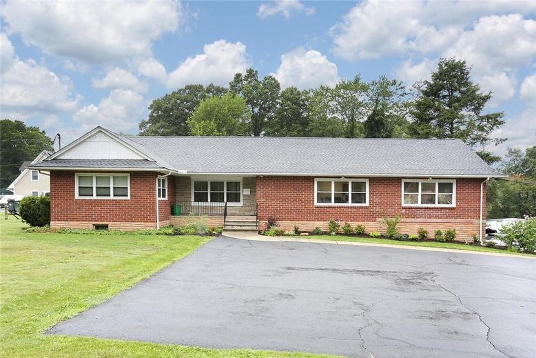 Exterior, Facade, Brick Facade, Cape Cod