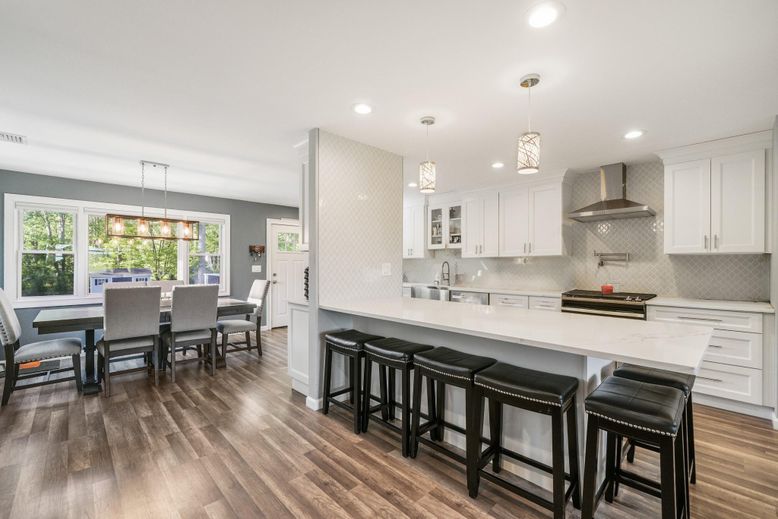 Dining room, Interior, Kitchen, Pendant Lights, Recessed Lighting, Stainless Steel Appliances, Wood Texture Flooring