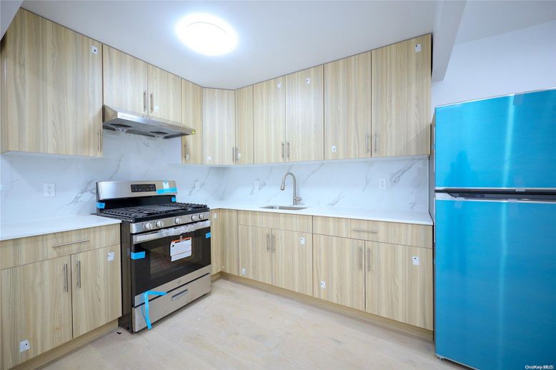 Interior, Kitchen, Marble Walls, Stainless Steel Appliances, Wood Texture Flooring