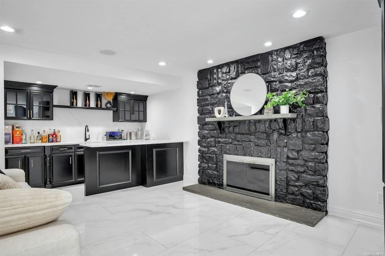 Fireplace, Interior, Marble, Recessed Lighting, Stone Walls