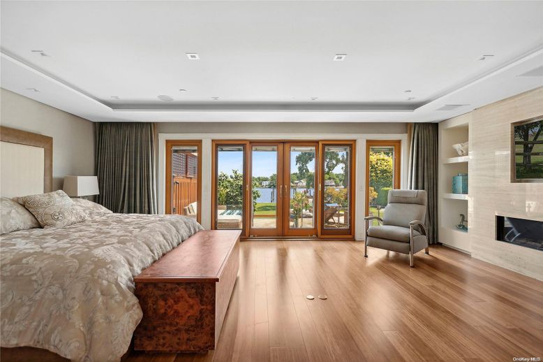 Bedroom, Fireplace, Interior, Recessed Lighting, Wood Texture Flooring