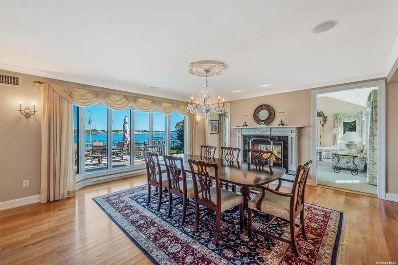 Chandelier, Dining room, Fireplace, Interior, Water, Wood Texture Flooring