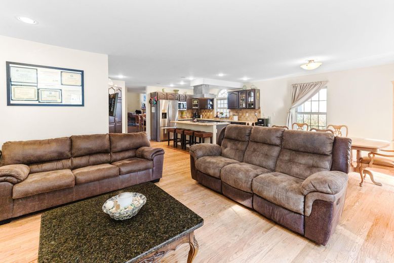 Dining room, Interior, Kitchen, Living room, Recessed Lighting, Stainless Steel Appliances, Wood Texture Flooring