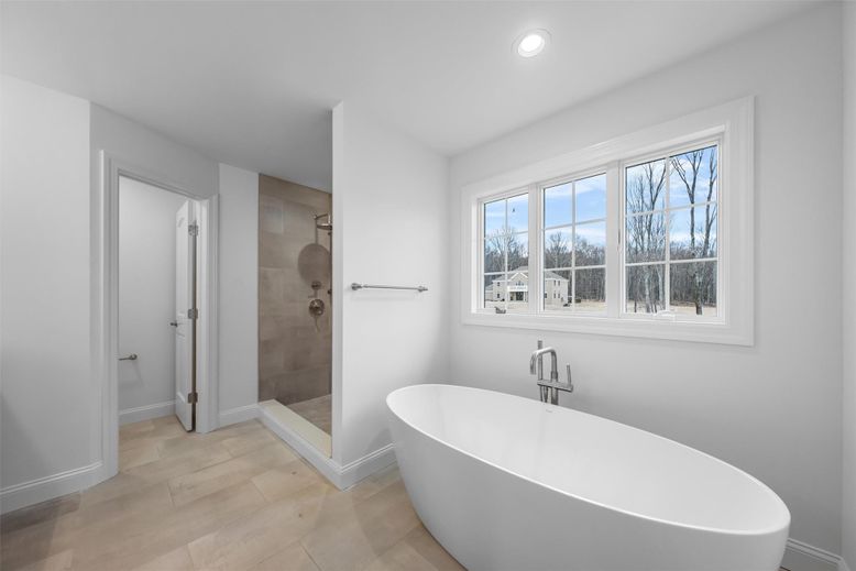Bathroom, Free Standing Baths, Glass Shower, Interior, Recessed Lighting, Wood Texture Flooring