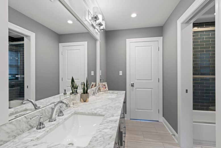 Bathroom, Dual Sink Vanities, Interior, Recessed Lighting, Wood Texture Flooring