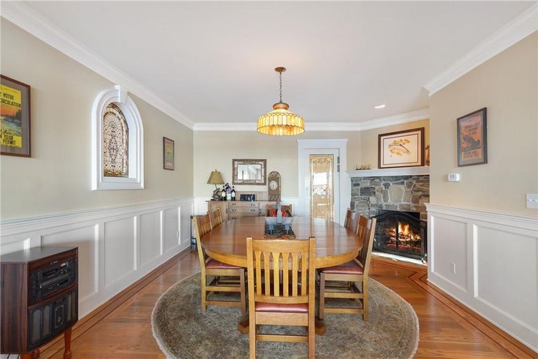 Dining room, Fireplace, Interior, Pendant Lights, Recessed Lighting, Wood Texture Flooring